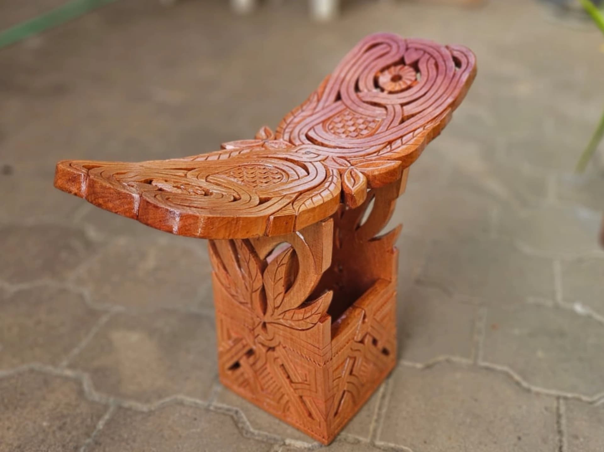 Maroon woodcarving